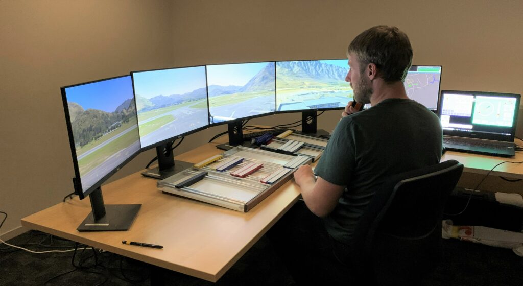 ATC training in a mobile simulator at Queenstown Tower, with real-time remote piloting from Christchurch, New Zealand.